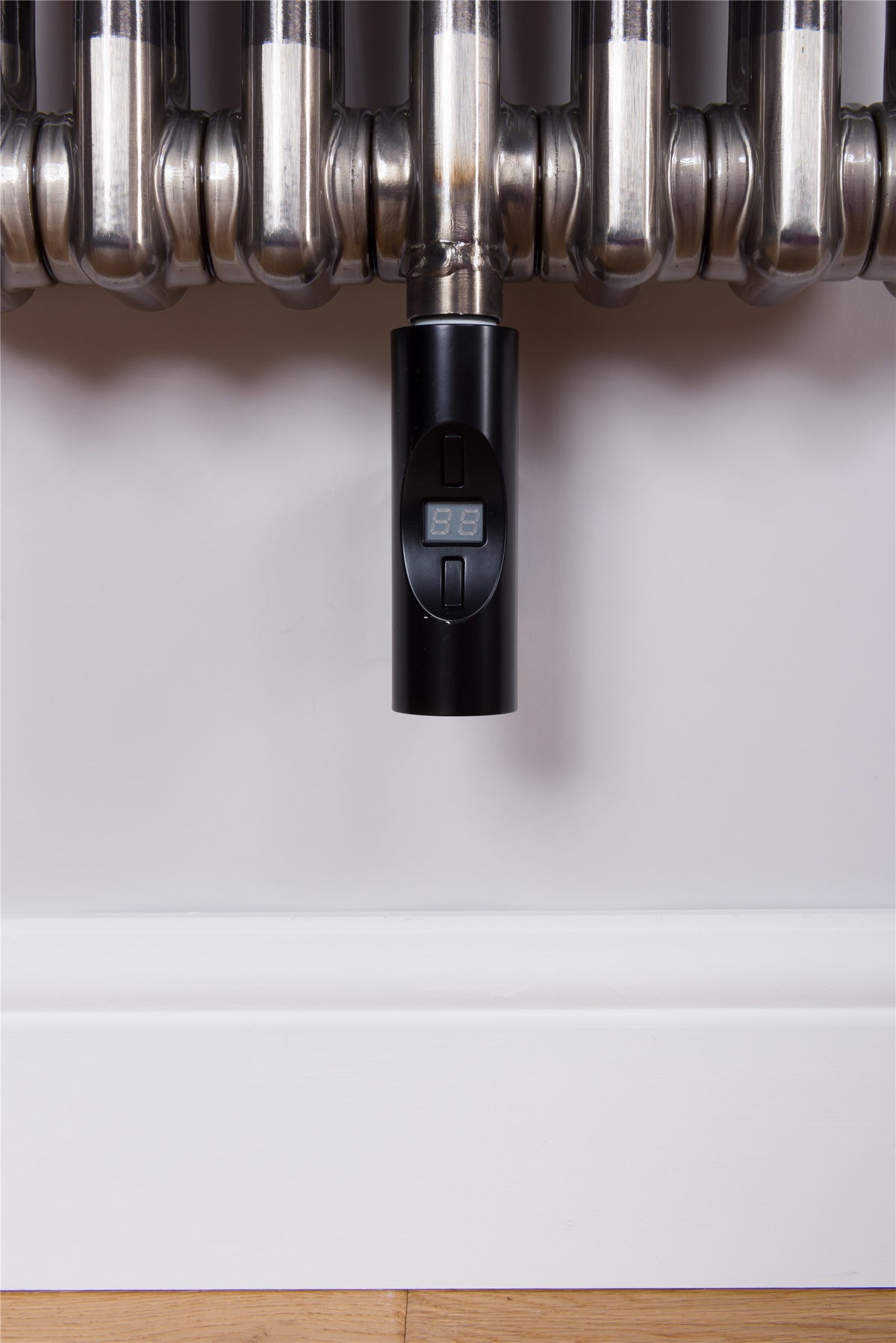 DQ Modus Electric Vertical Column Radiator – element detail, Bare Metal Lacquer (official, 7360 px original)