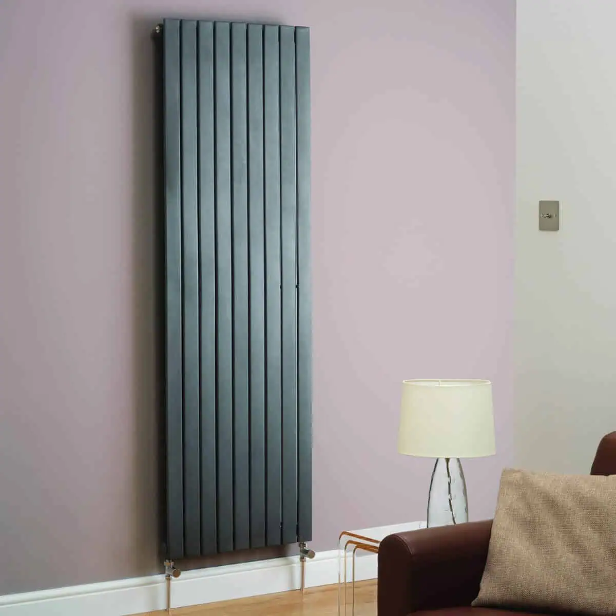 Unique modern vertical radiator in a contemporary living room setting.