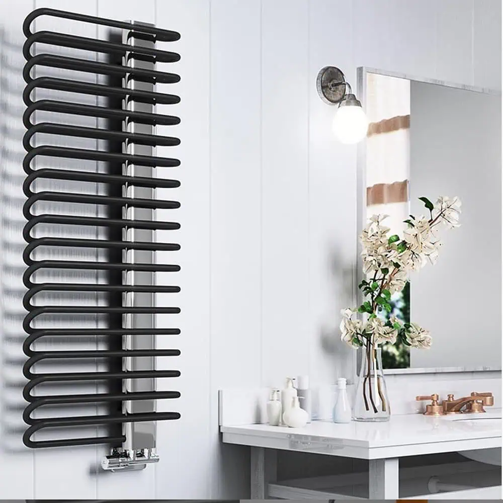 Black modern towel radiator in a stylish bathroom setting.