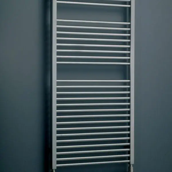 Shower radiator towel rail in modern bathroom, sleek stainless steel design.