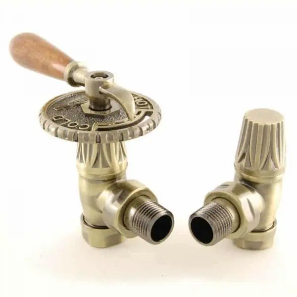 Industrial brass valve with wooden handle for plumbing applications.