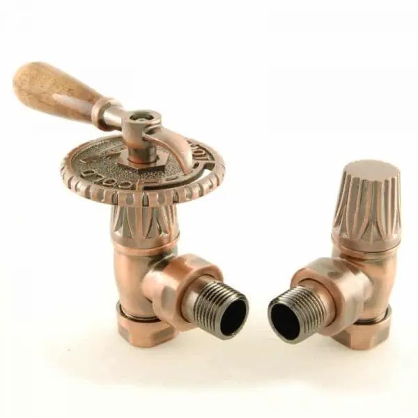 Bronze traditional radiator valve set with handwheel and fittings for heating system control.