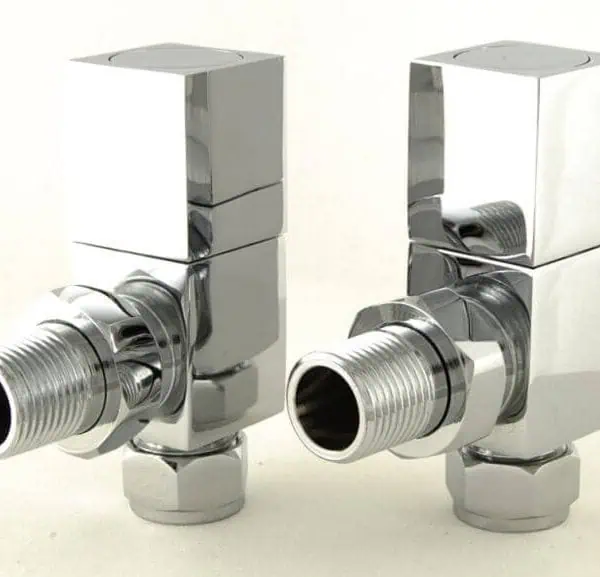 Shiny chrome plumbing valves for bathroom and kitchen installation.