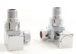 Shiny metallic compression fittings for plumbing systems.