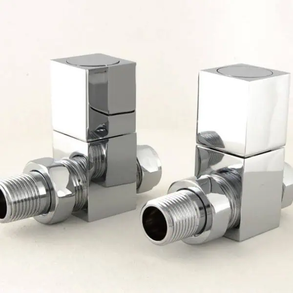 Shiny chrome plumbing valve fittings for efficient water connection.