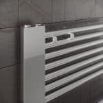 Modern aluminum towel radiator for bathroom heating and drying.