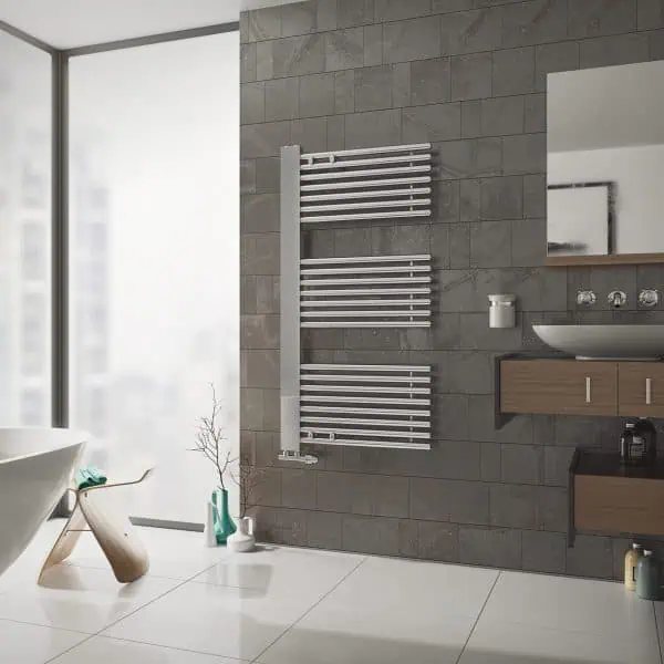 Modern heated towel radiator in a contemporary bathroom setting.