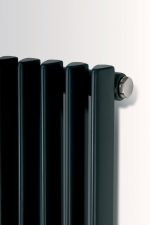 Black modern radiator with sleek design for home heating solutions.
