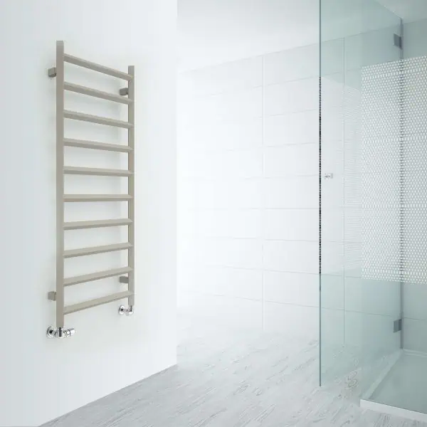Modern heated towel rail in bathroom, sleek design, energy-efficient radiator, bathroom heating solutions.