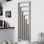 Radiator with modern geometric design in a contemporary living space.
