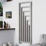 Radiator with modern geometric design in a contemporary living space.
