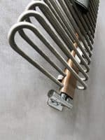 Metal radiator with modern design for home heating solutions.