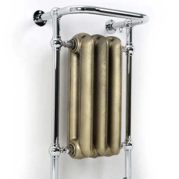 Radiator with chrome pipes and gold radiator element, modern central heating design.
