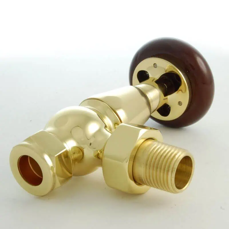 ETO-AG-B-CU00_800-1.jpg Brass and wooden valve components for water heater or plumbing systems.