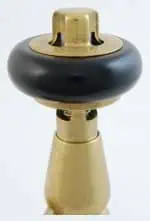 Vintage brass and black handle door lock cylinder with knob.