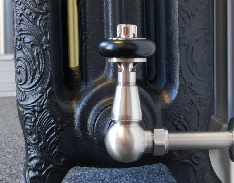 FAR-CR-COM1_800-1.jpg Oil drum valve close-up with intricate black design - industrial equipment for POSHRads.