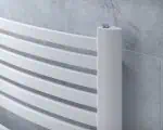 Modern white towel radiator for bathroom heating and drying.