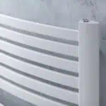 Modern white electric towel radiator heater for bathrooms.
