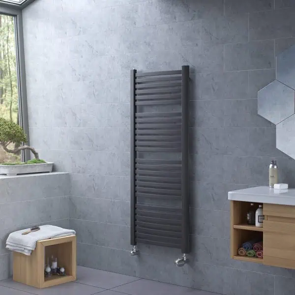 Modern black towel radiator in contemporary bathroom decor.