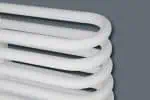 White modern towel radiator heating element for homes and bathrooms.
