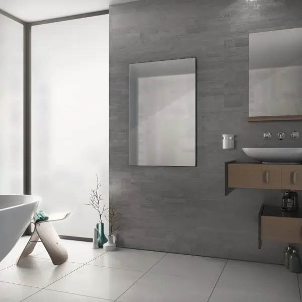 Bright modern bathroom with minimalist design, neutral gray tones, and sleek decor.