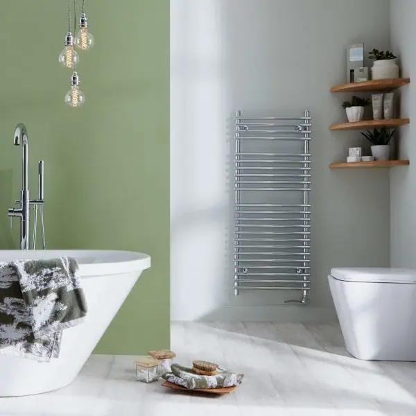 Modern bathroom with freestanding bathtub, wall-mounted towel radiator, and wooden shelves for decor and storage.