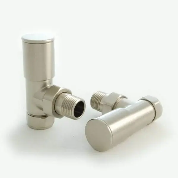 Shiny silver radiator valves for heating systems, close-up image.