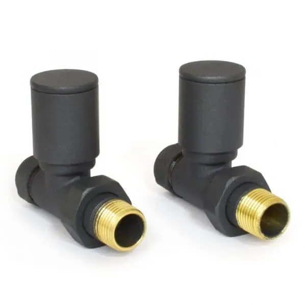 Robust black plastic and brass radiator valves for efficient heating system control.