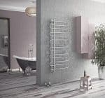 Modern heated towel radiator in stylish bathroom, wall-mounted design, chrome finish.