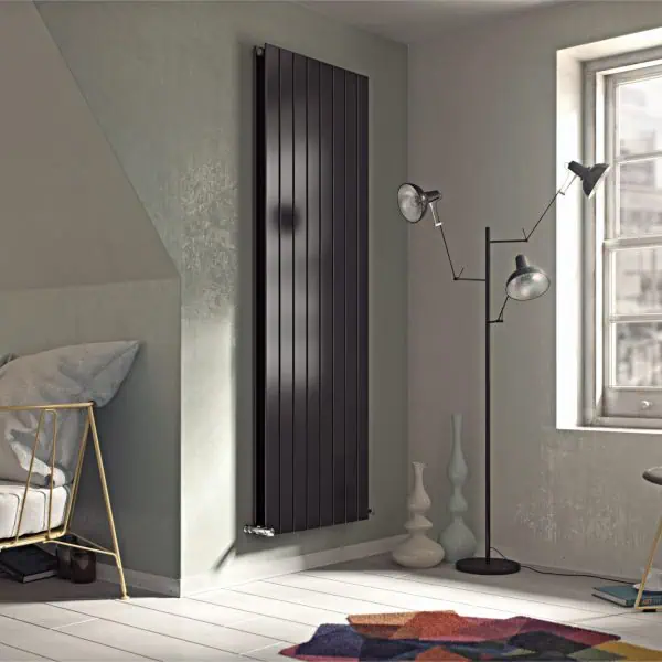 Modern radiator heating system in stylish bedroom decor.
