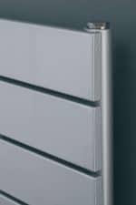 Modern grey metal storage drawers for organized office or home storage solutions.