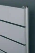 Modern grey metal storage drawers for organized office or home storage solutions.