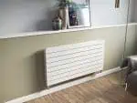 Modern white electric radiator for home heating, stylish and energy-efficient.