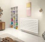 Contemporary white modern radiator in a stylish bedroom or living space.