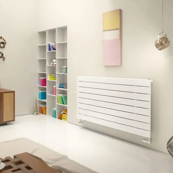 Contemporary white modern radiator in a stylish bedroom or living space.