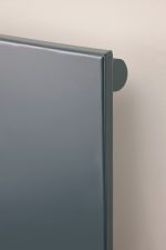 Durable grey metal radiator with sleek design, ideal for modern heating solutions.