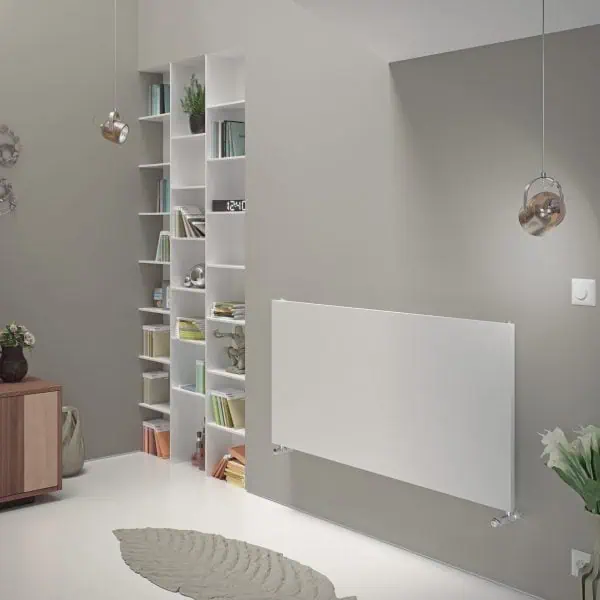 Contemporary living room with white shelving, wall-mounted radiator, and cozy decor, modern interior design.