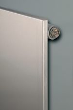 Radiator close-up image, modern stainless steel heating radiator for homes or offices.
