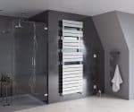 Modern white radiator towel warmer in a sleek bathroom with dark gray tiles.