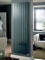 Modern vertical panel radiator heating system in a stylish living room.