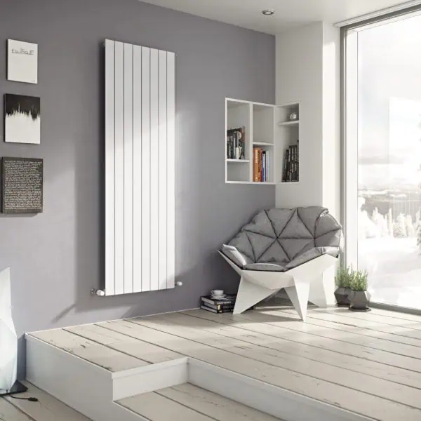 Stylish modern living room with unique seating and contemporary decor, natural light, and snow scenery.