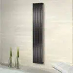Modern black vertical radiator, stylish wall-mounted heating unit for home decor and warmth.