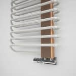 Elegant white and copper electric radiator heater with modern design, energy-efficient heating solution for homes.