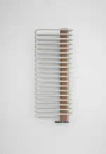 Modern towel radiator with white and copper design, ideal for bathroom heating solutions.