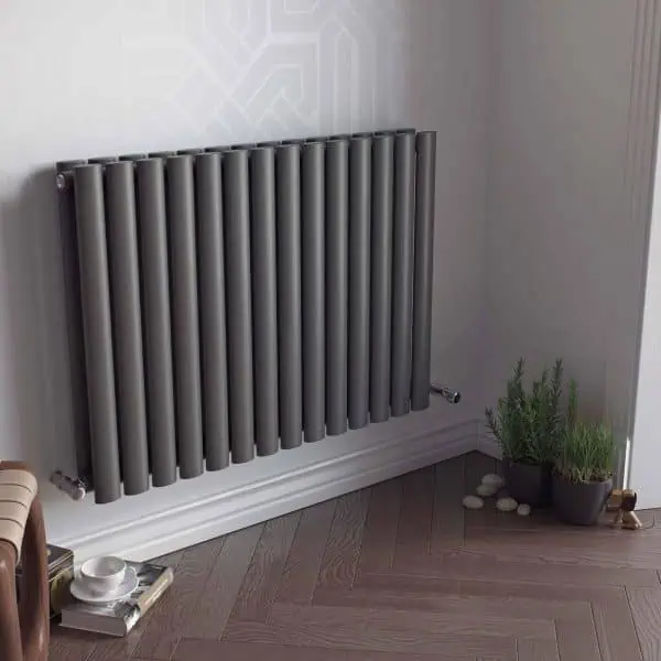 Stylish modern gray radiator in a contemporary living space, eco-friendly heating solution.