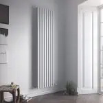 Vertical modern white radiator for home heating solutions.