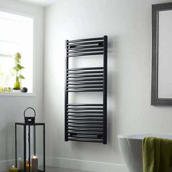 Black towel radiator for bathroom heating and drying solutions.