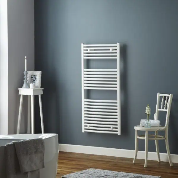Modern heated towel rail in a stylish bathroom, perfect for luxury home comfort.