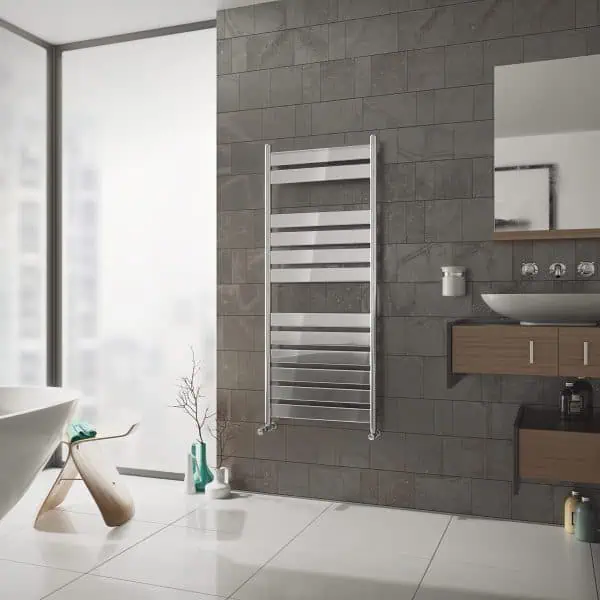 现代 stainless steel towel radiator in a contemporary bathroom setting.
