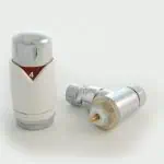 Thermostatic radiator valve system for home heating, chrome finish, adjustable temperature control.